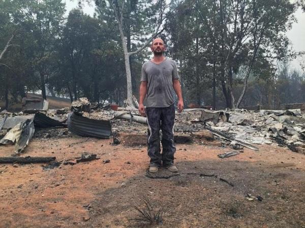 Mike Ray stands on what's left of his marijuana farm, following the Butte Fire in Calaveras County, California, in mid-September, 2015.  Image: Mike Ray via IBTimes.com
