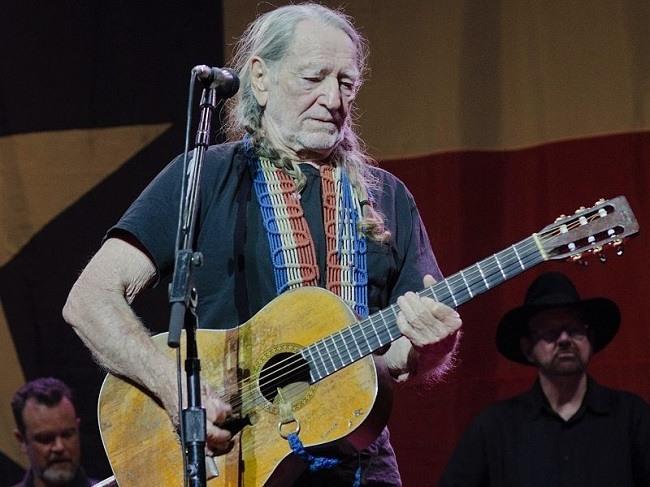 Willie Nelson performing at the Wellmont Theatre in Montclair, New Jersey, May 2012. Image: joshbg2k via Wikimedia Commons