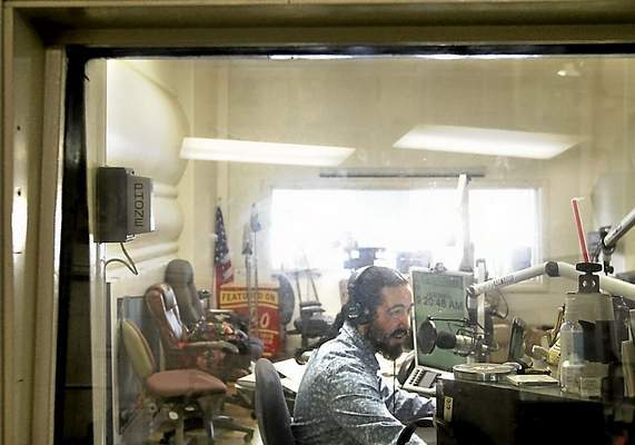 Christopher Carr broadcasts The Cannabis Connection live at KSCO 1080 AM on Friday nights. (Shmuel Thaler -- Santa Cruz Sentinel)