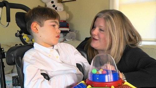 Kim Hearn of Stratford believes an oil made from marijuana plants will help her son Sean and other children who have epileptic seizures. Image: Fox 61 via Hartford Courant