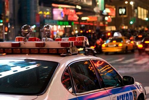 NYPD in Times Square. Image: William Hoiles via Wikimedia Commons.