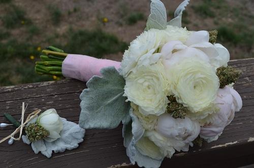 A wedding bouquet of peonies and cannabis buds. Image via BudsandBlossomsco.com