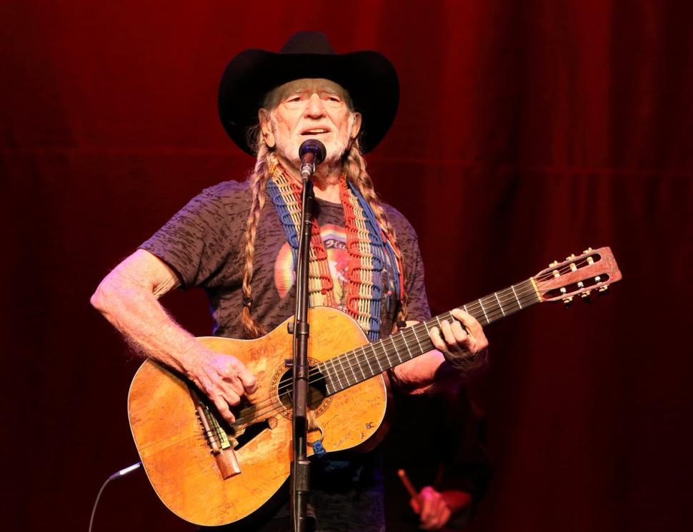 Image of Willie Nelson performing country western music